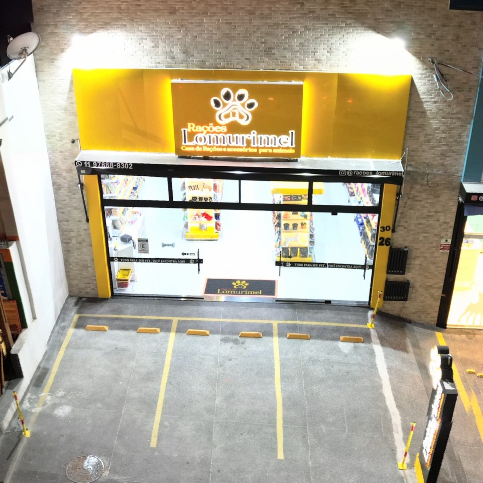 Foto Fachada Noturna Aerea da loja Lomurimel